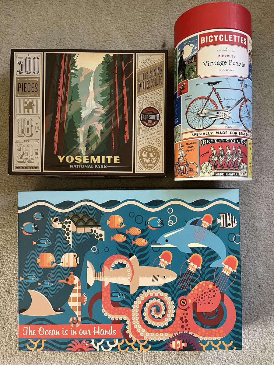 Three high-quality, like-new puzzles with modern designs