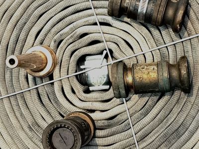 FOUR (4) Vintage Brass Fire Nozzles PLUS +50 feet of Fire Hose w/ org connecting metal ends ALL in VG Condition