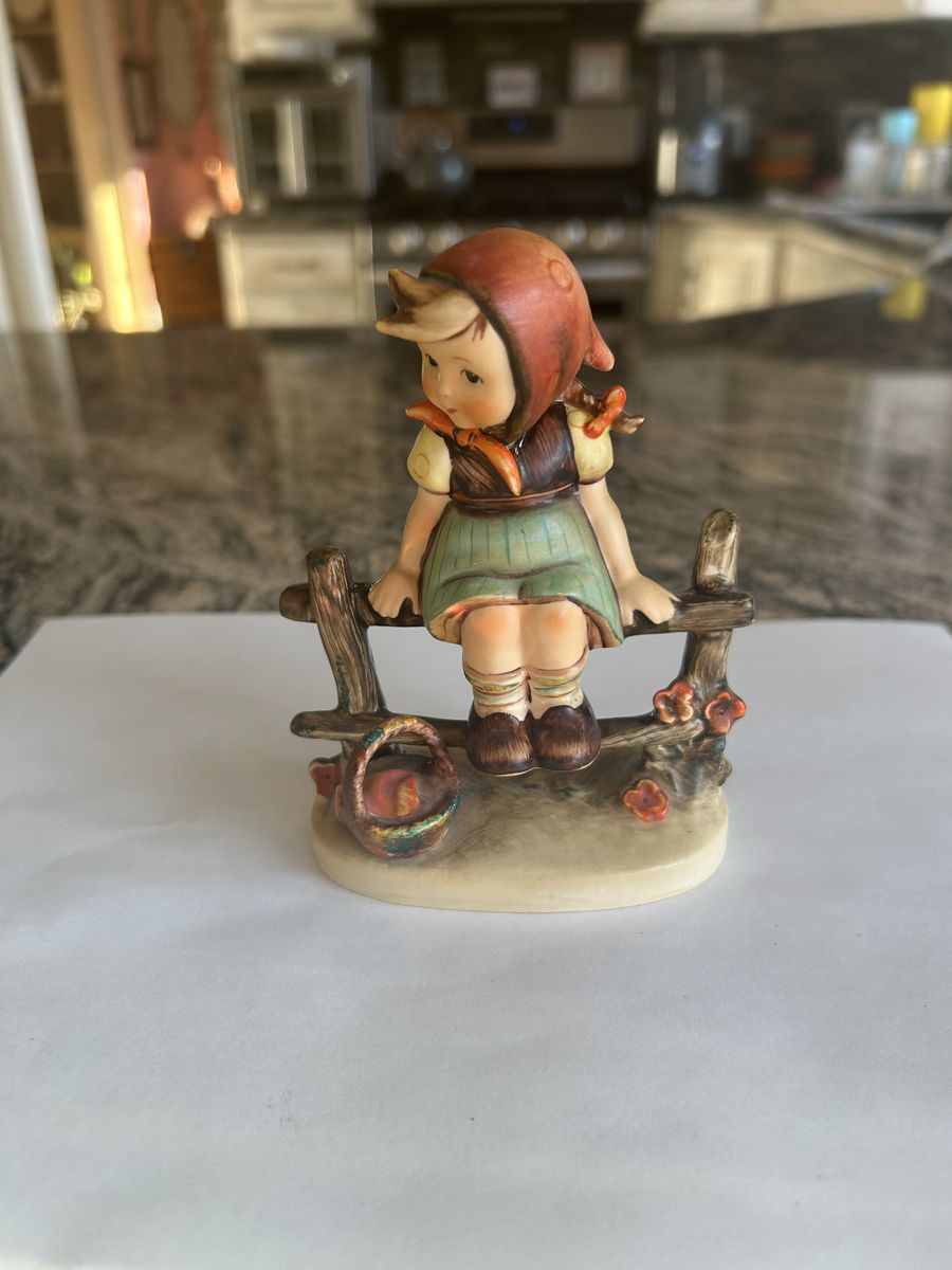 Vintage Goebel Hummel figurine titled “Just Resting.”