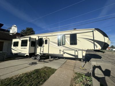2017 Sierra 371REBH 5th wheel. 43 feet, Midbunk, rear living 4 slides.