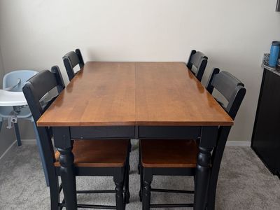 Counter‑height dining table with 4 matching chairs