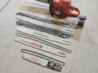 Husqvarna 575XP Gas Chainsaw with Extra Bars and Chains