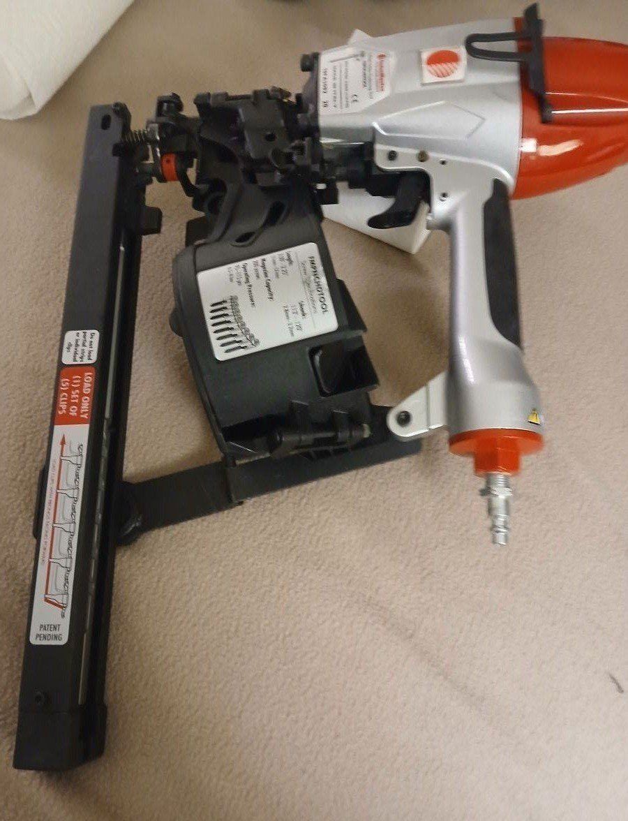 FastenMaster air gun for installing hidden clips