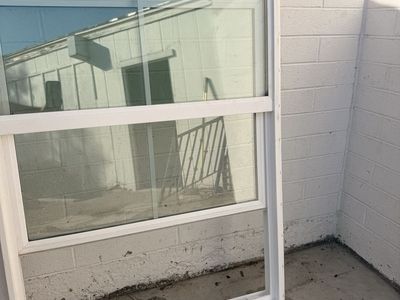 White Vinyl Single-Hung Window with Grids