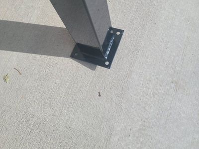 New 3"×3"×6' steel posts with mounting plate