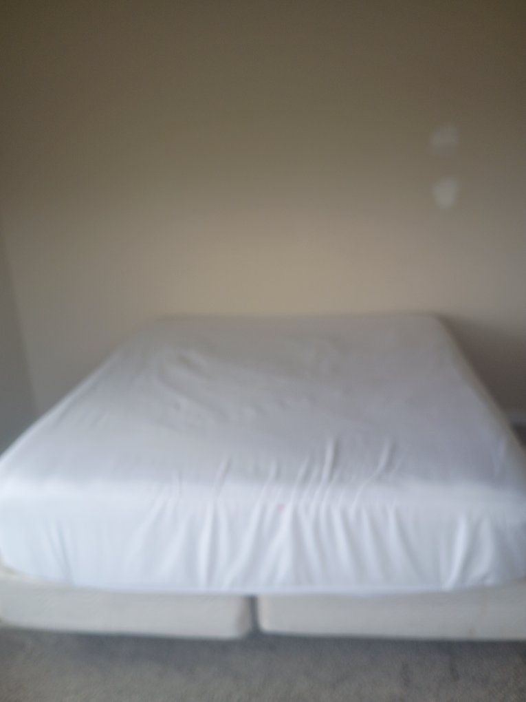 Cal King Mattress with Box Spring. Great shape, deal is you have to haul away an entertainment center if you want it free!
