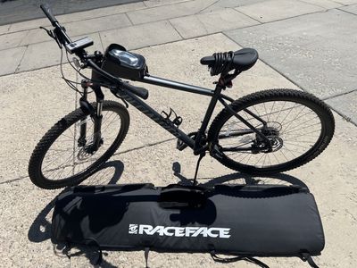 Reliable Specialized Rockhopper XL mountain bike and tailgate pad combo