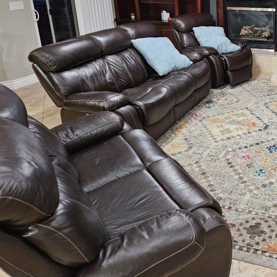3 matching leather recliners with USB