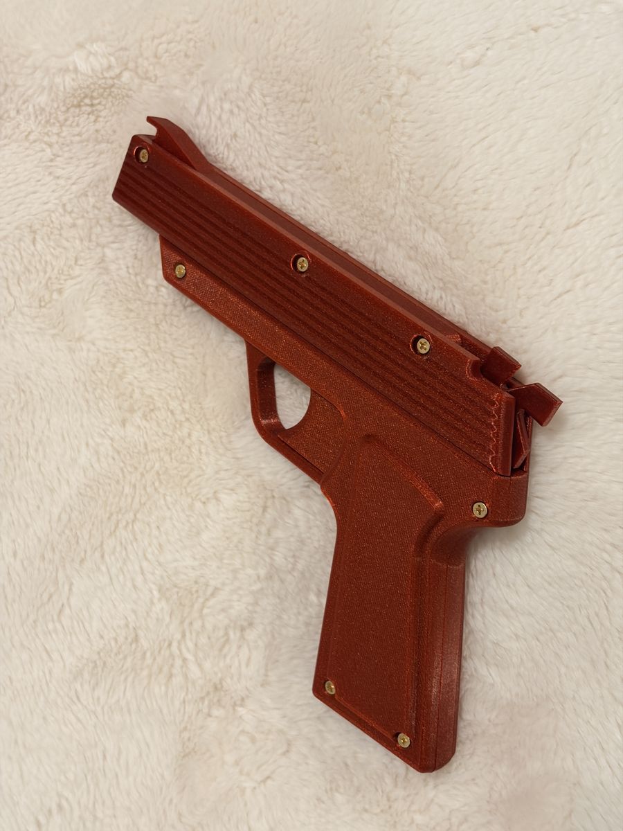 Toy rubber band gun