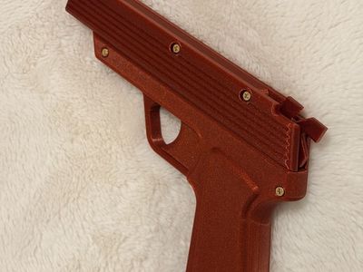 Toy rubber band gun