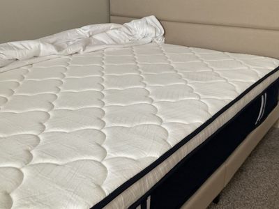 Nearly new queen mattress and low platform bed frame