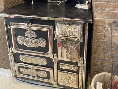 Beautifully restored wood or coal burning antique stove