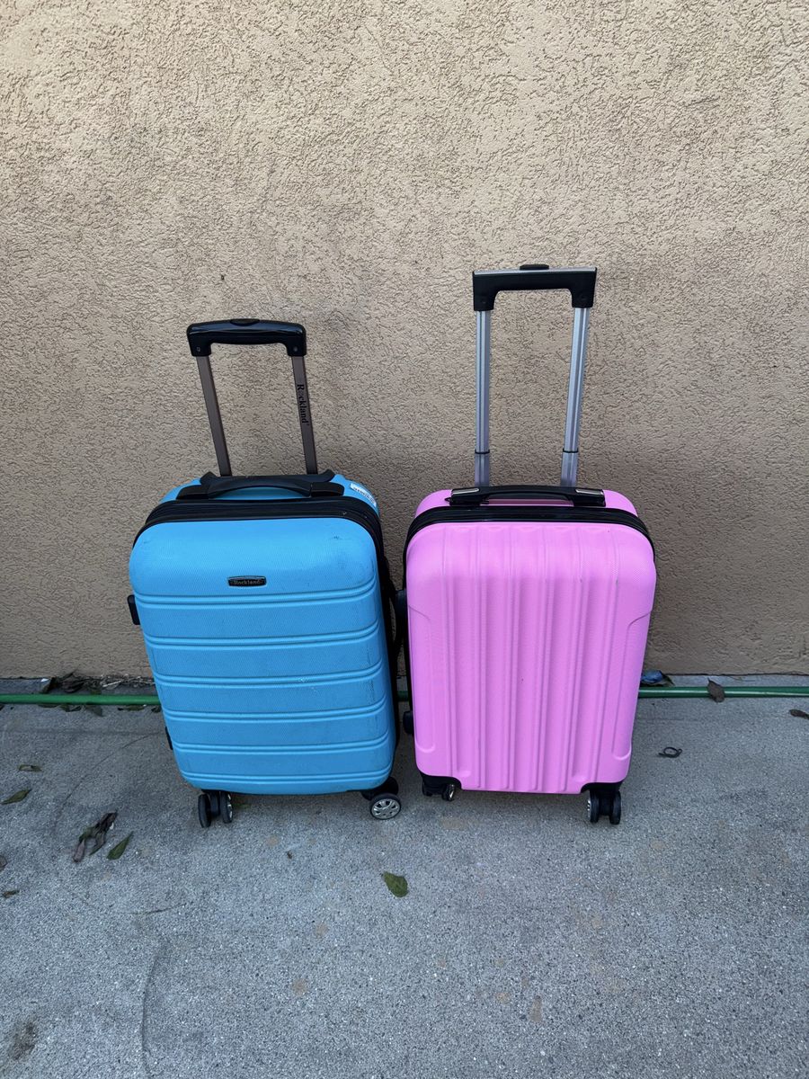 2 beautiful hard shell carry on luggages