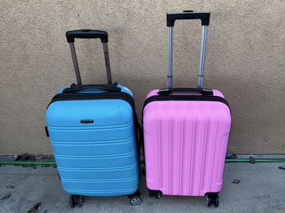 2 beautiful hard shell carry on luggages