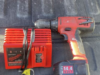Milwaukee Heavy-Duty 14.4V Cordless Drill & Charger 2.4Ah NiCd/NiMH Universal $25