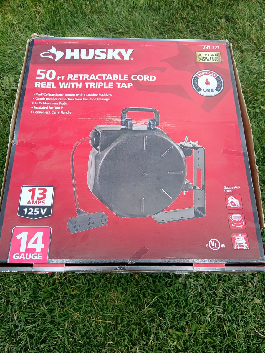 Husky 50 ft. Retractable Extension Cord Reel with Triple Tap, 14-Gauge, 13-Amp, Wall/Ceiling Mount