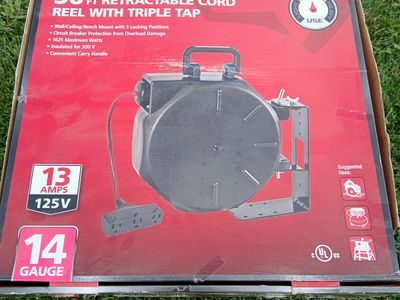 Husky 50 ft. Retractable Extension Cord Reel with Triple Tap, 14-Gauge, 13-Amp, Wall/Ceiling Mount