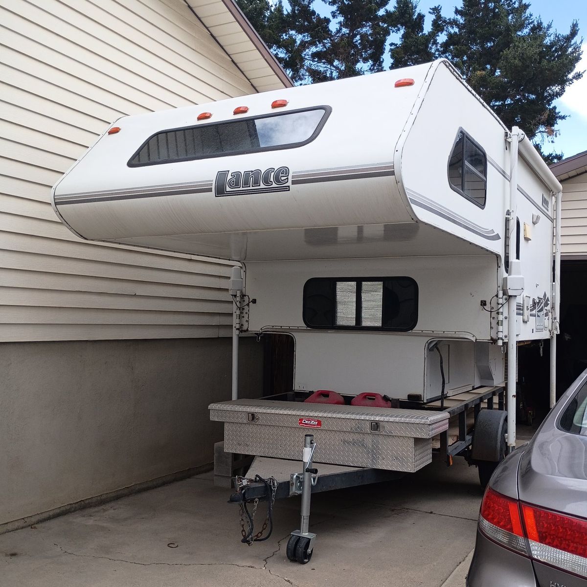 Lance Truck Camper with Kitchen & Bathroom including a shower