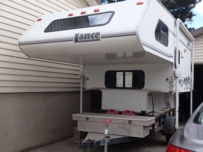 Lance Truck Camper with Kitchen & Bathroom including a shower
