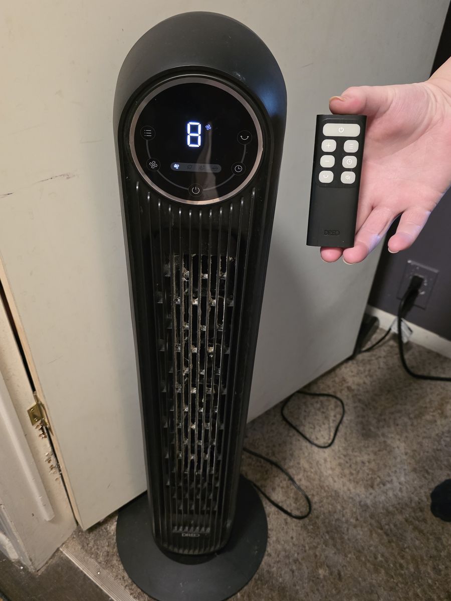 Rotating standing fan