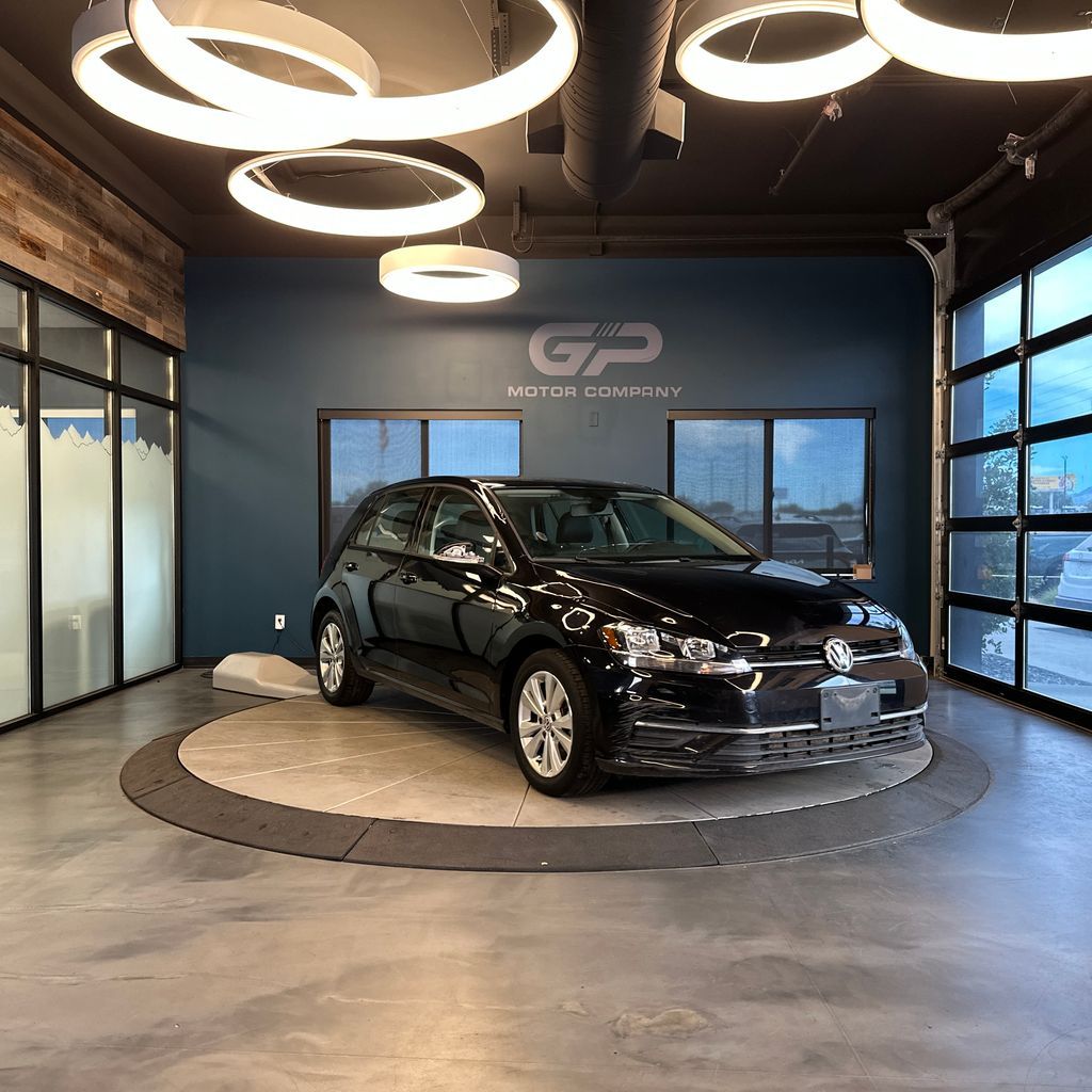 2021 Volkswagen Golf TSI — rebuilt & branded title, 6% below market