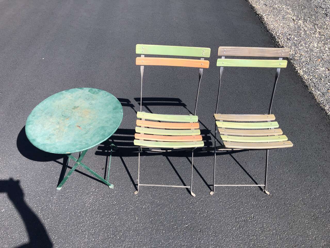 PAIR of  French made metal bistro folding chairs. Made in France by Fermob. Sold by Pottery Barn patio deck furniture