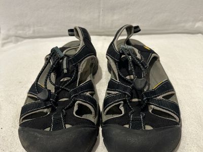 Keen women’s size 10, or men’s 8.5 black waterproof, hiking sandals