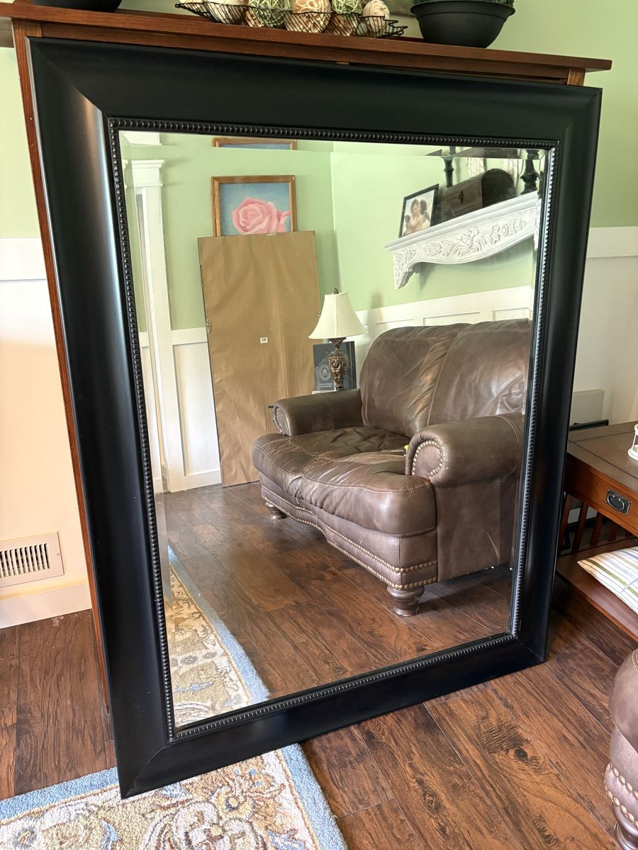 Mirror with black frame