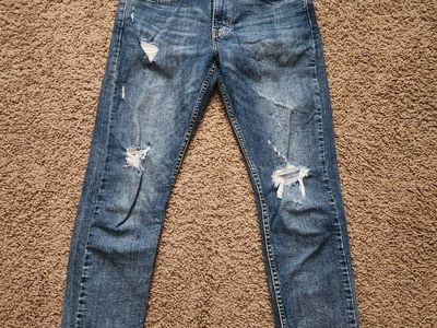 Levi ripped skinny taper 32l 32w