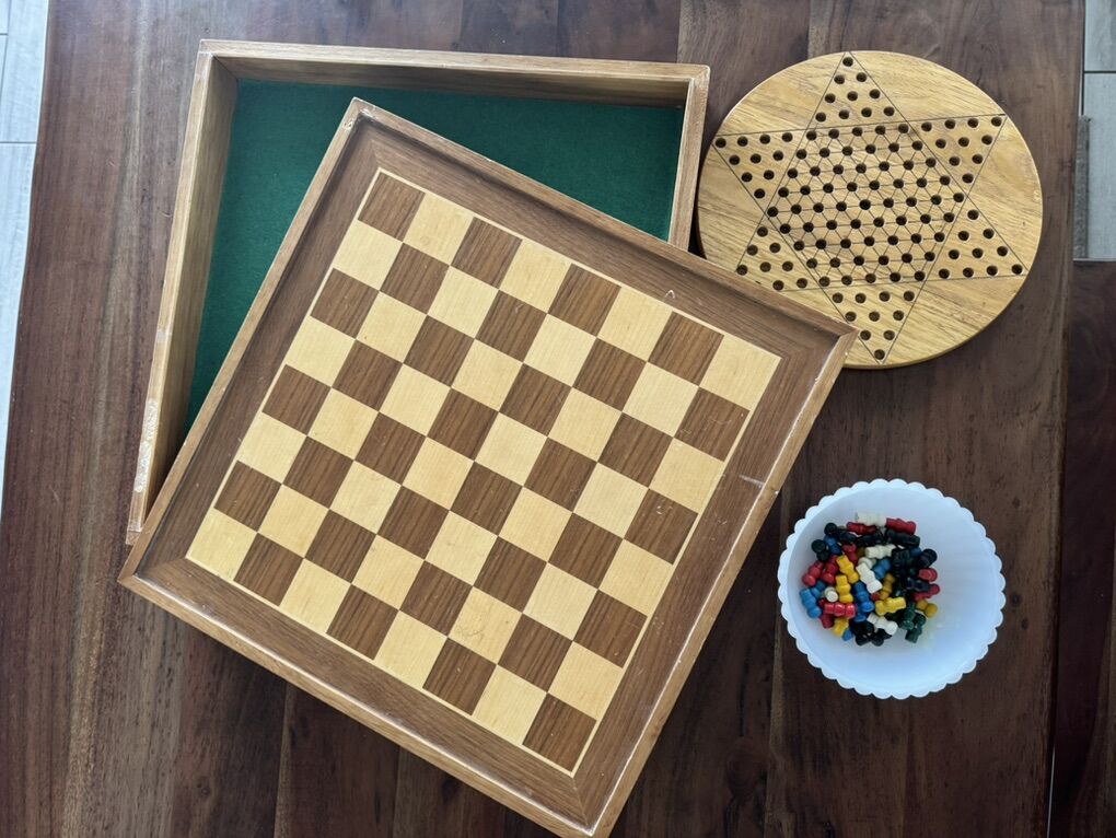 Vintage wood chess board and Chinese checkers set.