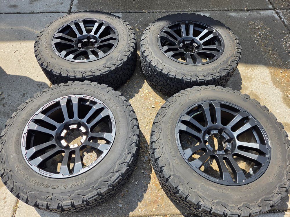 LT265/60r18 ko2s Tacoma wheels and tires.