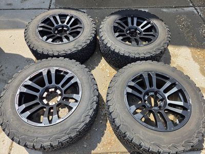 LT265/60r18 ko2s Tacoma wheels and tires.
