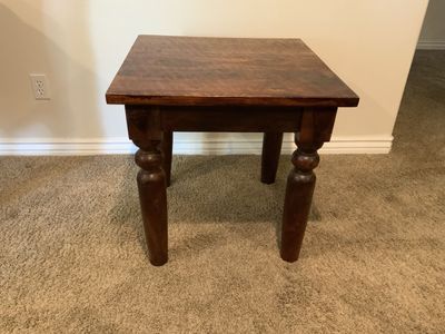 Solid, dark, wood accent table