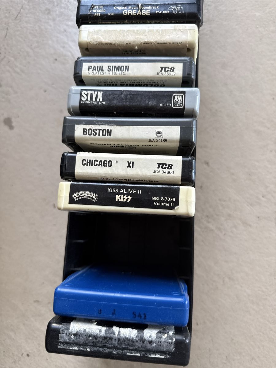 Vintage 8-Track Tape Lot with Storage Holder - Grease, Paul Simon, Styx, Boston, Kiss