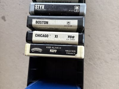 Vintage 8-Track Tape Lot with Storage Holder - Grease, Paul Simon, Styx, Boston, Kiss