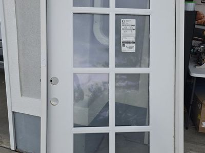 New Exterior Door with 8-Lite Glass Windows