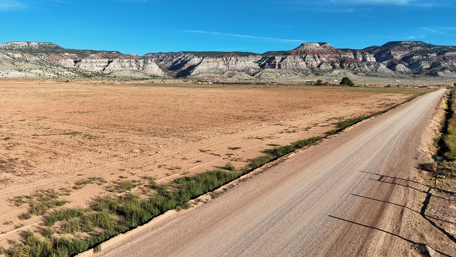 40 Tillable, Irrigated Acres with dual-road access and views
