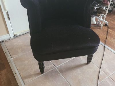 Black Velvet Accent Chair with Tufted Back and Turned Wooden Legs