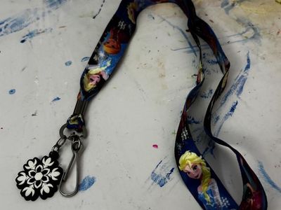 Disney Frozen Elsa & Anna Character Lanyard with Snowflake Charm