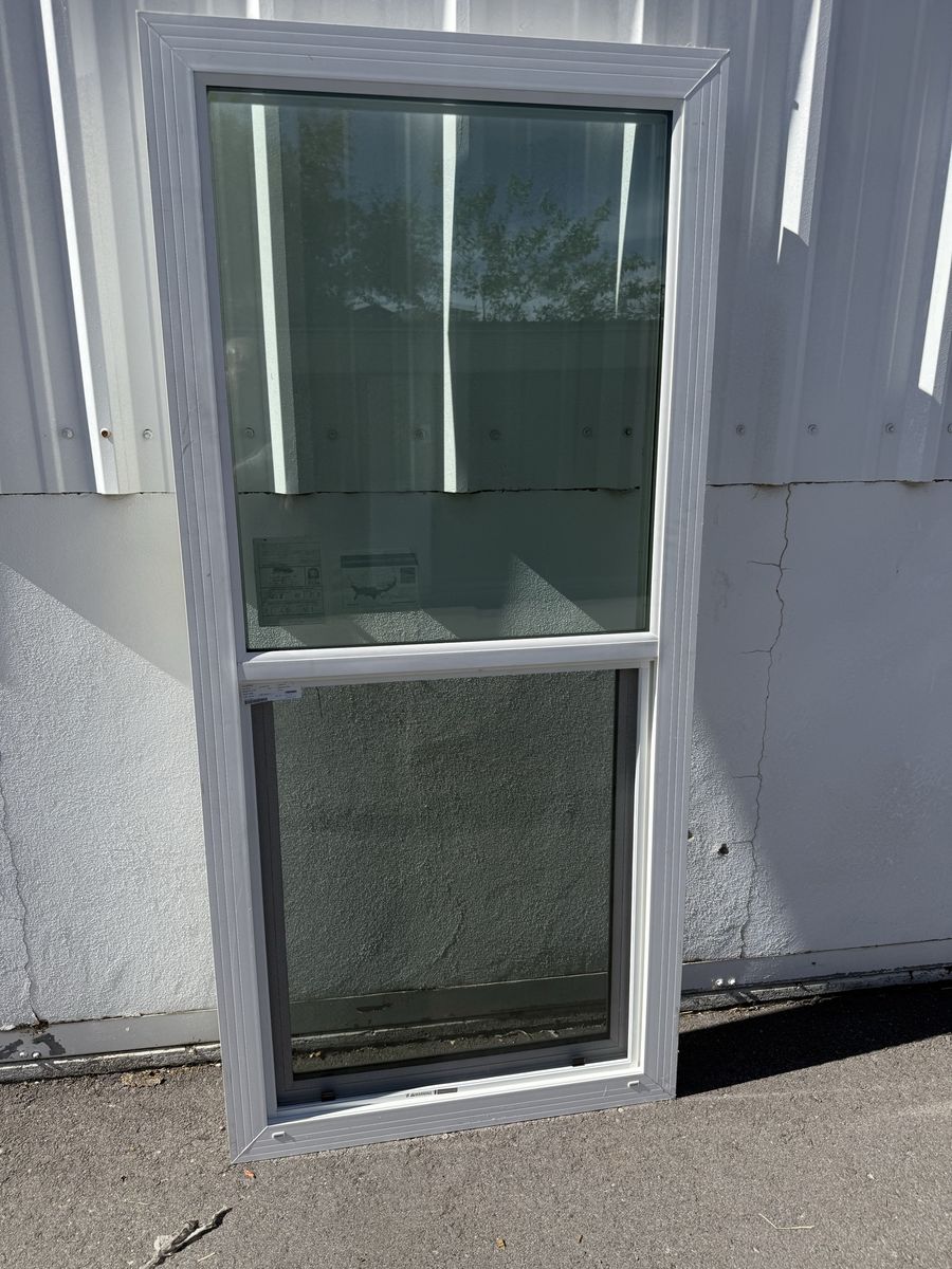 New Single Hung White Vinyl Window,  31 3/4” x 72 3/4”
