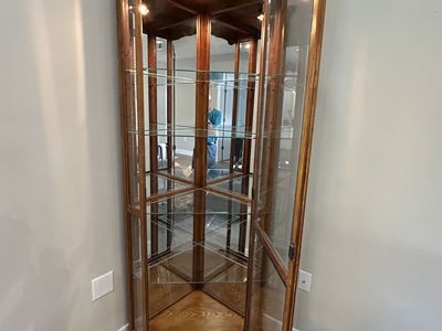 Solid Oak Lighted Corner Curio Cabinet with Beveled Glass, Mirrored Back, Glass Shelves & Key