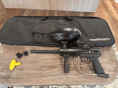 Valken SW-1 paintball gun with case and accessories.