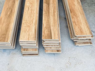 Unused Light Wood Laminate Flooring Planks - Ideal for Home Renovation Projects