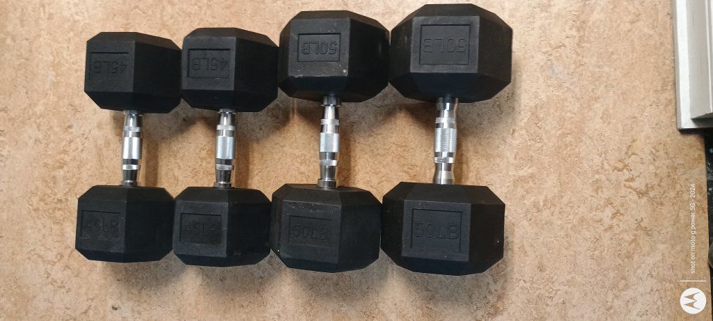 sweet of 45 and 50lb rubber hex dumbbells