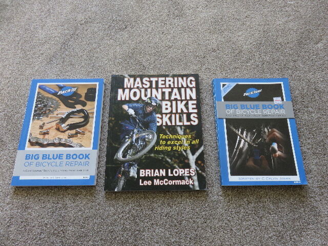 LOT OF THREE BIKING BOOKS - TWO REPAIR AND ONE RIDING