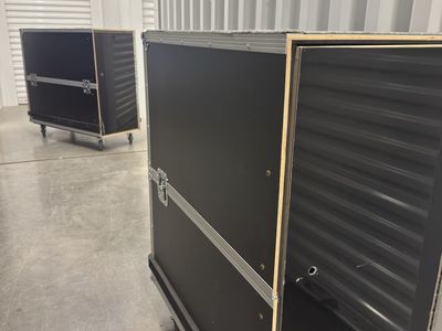 Two storage boxes-currently used for artwork