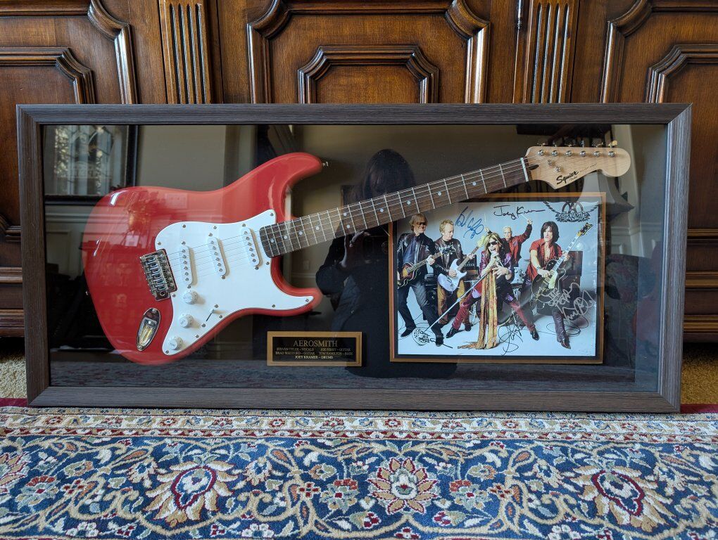 Aerosmith Autographed Photo With Guitar