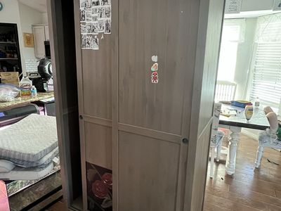 Spacious Wooden Wardrobe with Sliding Doors & Interior Shelves - Perfect for Bedroom Storage