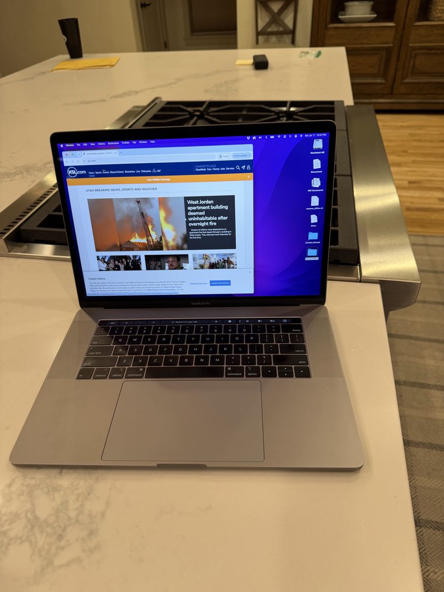 Apple MacBook Pro 15" with i9 processor, 32GB RAM, 1TB SSD Space Gray w/ Touch Bar & ID + Extras
