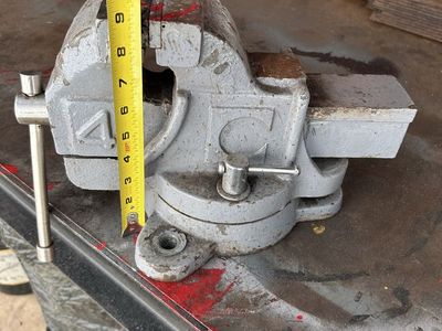 Heavy-Duty Bench Vise - Grey Steel 4-inch Jaws, Swivel Base, Workshop Tool